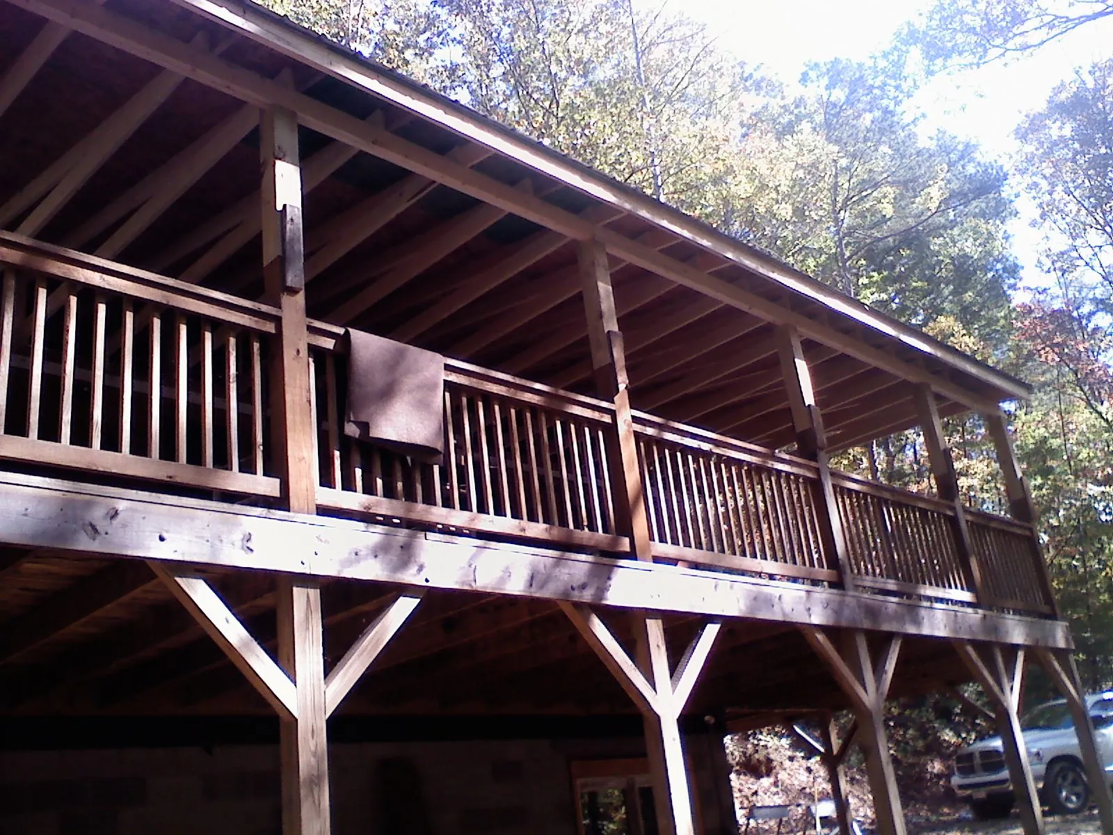 Timber framing under a new elevated porch and deck — Roof Leak Repair in Horntown by Roofing Brothers